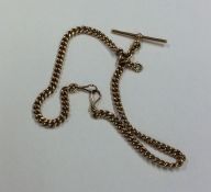 A good 18 carat curb link watch chain with bar. Ap