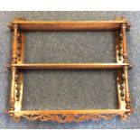 A mahogany wall bracket with turned decoration. Es