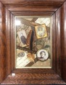 An oak framed and glazed collage of Military desig