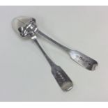 A large Georgian Irish silver rat tail spoon toget