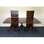 A good Georgian mahogany three pillar dining table