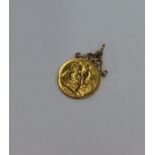 A 1914 sovereign mounted as a pendant. Approx. 8.7