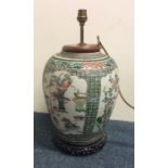 An Antique Chinese lamp attractively decorated wit