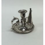 A Victorian silver miniature chamber stick and snu
