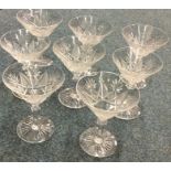 A set of eight cut glass tapering champagne glasse