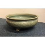 A good celadon censer decorated with flowers and l