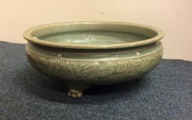 A good celadon censer decorated with flowers and l