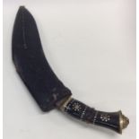 An ebony mounted Gurkha knife together with a mini
