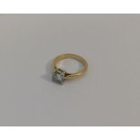 A princess cut single stone diamond ring in platin