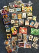 A box containing numerous trading cards and sticke