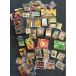 A box containing numerous trading cards and sticke