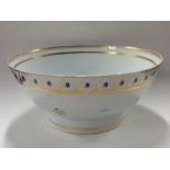 CHAMBERLAINS: A large white pottery fruit bowl dec