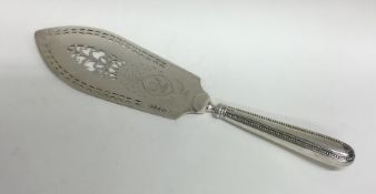 A good Georgian silver fish slice with bright cut