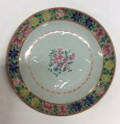 A Chinese decorated shallow bowl impressed with fl