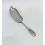 A Georgian silver fiddle pattern fish slice with p