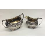 A good Georgian silver cream jug and sugar bowl of