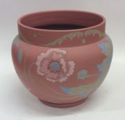 LANGLEY: A decorative jardiniere in terracotta wit