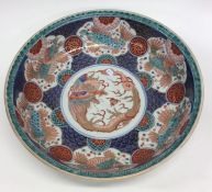 A large Chinese blue and white bowl decorated with