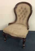 A Victorian button back nursing chair. Est. £30 -