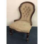 A Victorian button back nursing chair. Est. £30 -