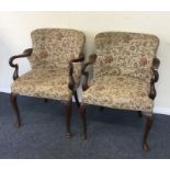 A pair of Edwardian mahogany chairs with cabriole