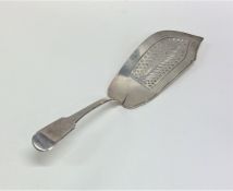 A silver fiddle pattern fish slice with pierced bo