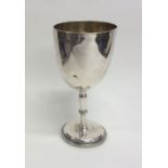 A plain Victorian silver goblet. London. By HH. Ap