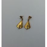 A pair of 18 carat four stone earrings. Approx. 5