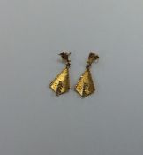 A pair of 18 carat four stone earrings. Approx. 5