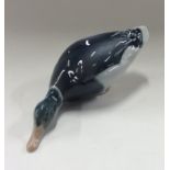 A Royal Copenhagen model of a duck. Est. £15 - £20