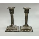 A pair of Victorian silver candlesticks with twist