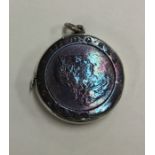 A circular silver mounted hinged top vesta case in