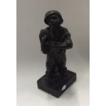 A heavy bronze Austro-Hungarian figure of a boy wi