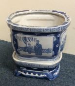 A 20th Century Chinese blue and white jardiniere o