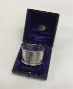 An Edwardian silver napkin ring. Sheffield. By RM&