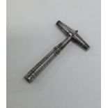 A Georgian silver bright cut travelling corkscrew