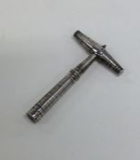 A Georgian silver bright cut travelling corkscrew