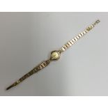 A small lady's gold Rotary wristwatch. Approx. 13.