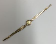 A small lady's gold Rotary wristwatch. Approx. 13.