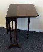 A small Pembroke table. Est. £20 - £30.