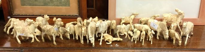 A large quantity of carved bone horses depicting the 'Eight Horses of Mu Wang'. Est. £100 - £150