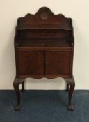 A Georgian style side table with shaped top to cab