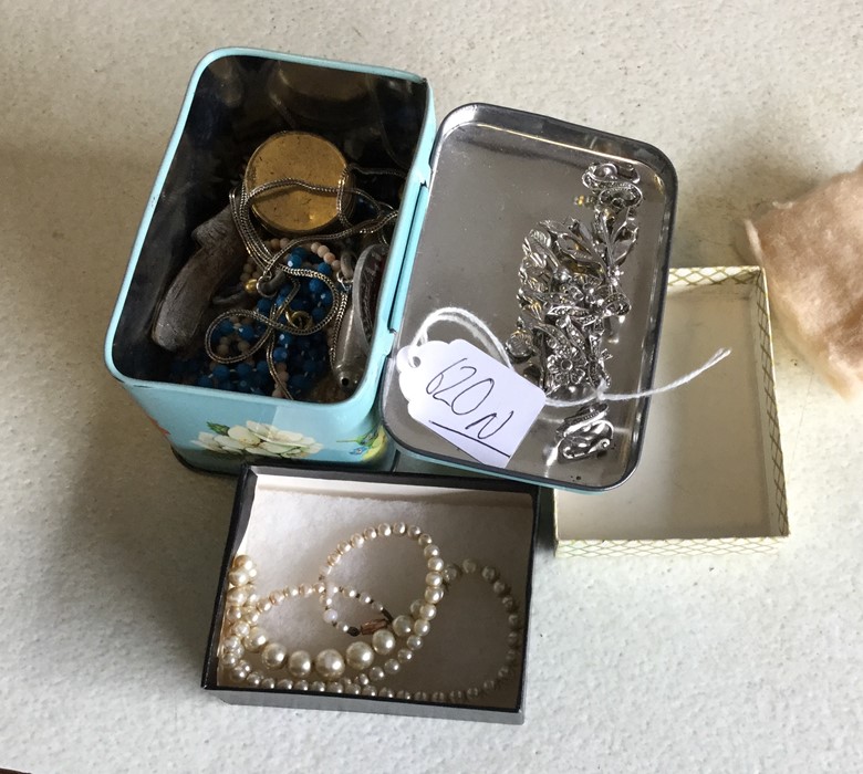 A collection of silver and other costume jewellery