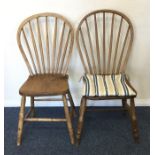 A pair of stripped pine kitchen chairs. Est. £50 -