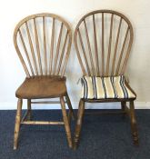 A pair of stripped pine kitchen chairs. Est. £50 -