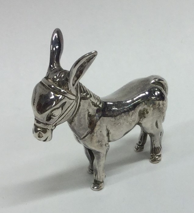 A Continental silver model of a donkey in standing
