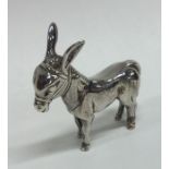 A Continental silver model of a donkey in standing