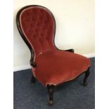A Victorian button back nursing chair in pink velv