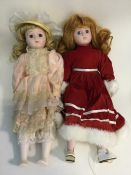 Two dressed 'Heritage Mint' porcelain headed dolls
