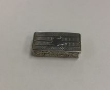 A Georgian silver hinged top vesta case / snuff bo
